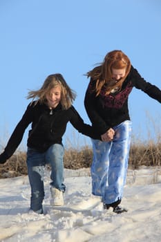 2 Young Girls Playing in the Snow Canada