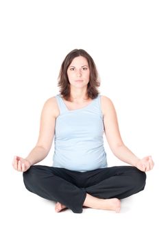 Portrait of pretty pregnant woman practicing physical exercise isolated on white