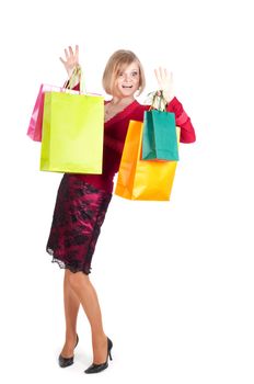Beautiful woman with shopping bags isolated onwhite