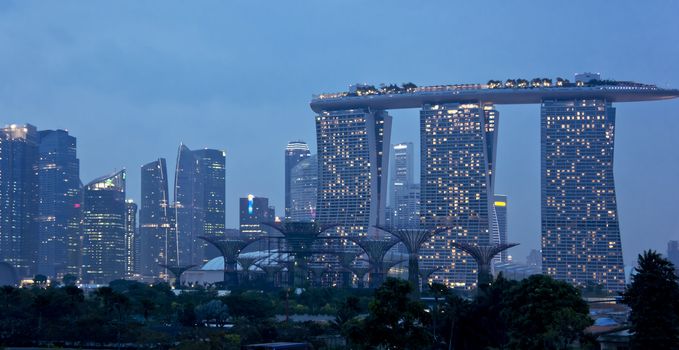 Cityscape behind a huge garden at night, Singapore