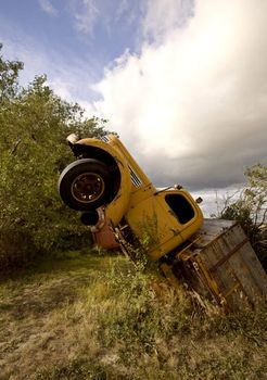 Antique truck sticking out of ground in Saskatchewan Canada