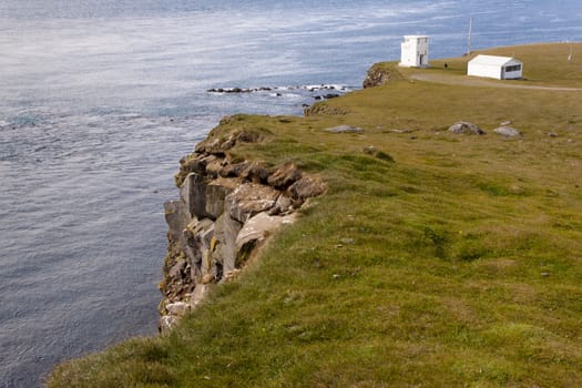 White small lighthouse on northwestern tip of Iceland.