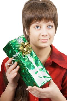portrait of an attractive young woman with a gift on a white background
