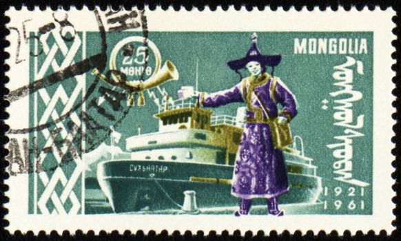 MONGOLIA - CIRCA 1961: stamp printed in Mongolia, shows passenger ship and man in national Mongolian costume, series, circa 1961