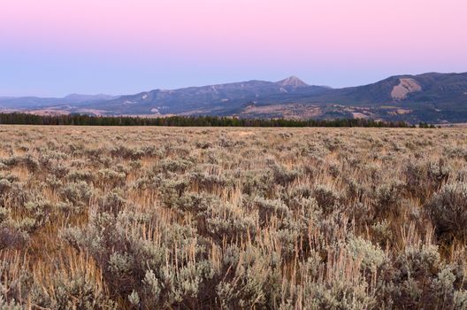 Sagebrush flats and the Gros Ventre Mountains after sunset, Grand Teton National Park, Wyoming, USA