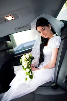 a bride in the car