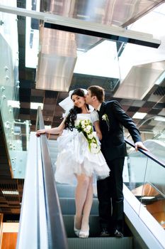 bride and groom in metro