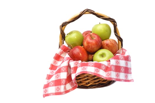 apples in a basket isolated on a white background