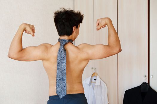 man doing morning exersices with necktie