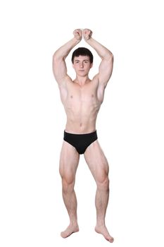 The young body builder poses with greater muscles on a white background