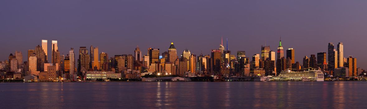 Panorama of Midtown Manhattan skyline and the Hudson River at sunset, New York City, New York, USA