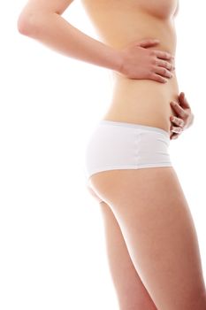 Close up photo of a side view of the female body, isolated on white background
