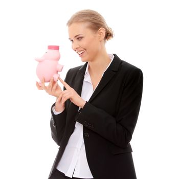Businesswoman holding piggy bank. Isolated on white background