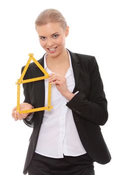 Beautiful businesswoman with house model , isolated on white background
