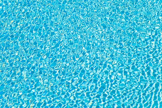 Abstract composition of the water of a swimming pool and its reflections