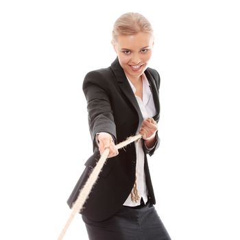 Businesswoman pulling on a piece of rope. Isolated on white
