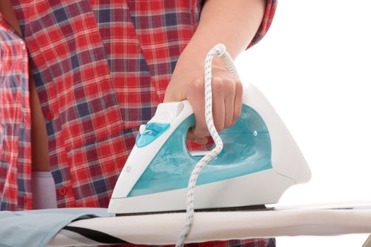 Happy young woman ironing on ironing board,isolated on white background.