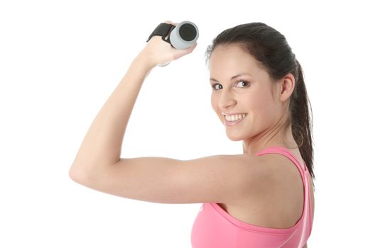Beautiful young woman doing exercise with dumb bells , isolated