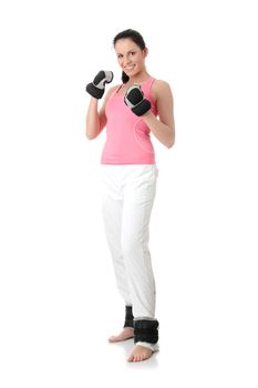 Beautiful young woman doing exercise with dumb bells , isolated