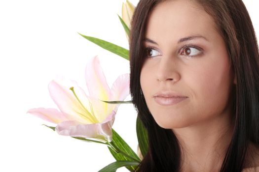 Beautiful young woman with lily flower. Isolated