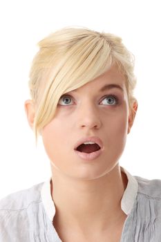 Shocked young beautiful woman isolated on white background