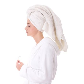 Portrait of young beautiful woman wearing bathrobe, isolated on white