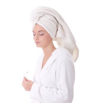 Portrait of young beautiful woman wearing bathrobe, isolated on white