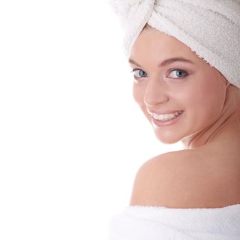 Portrait of young beautiful woman wearing bathrobe, isolated on white