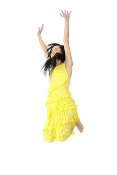 Young happy woman jumping. Isolated on white background