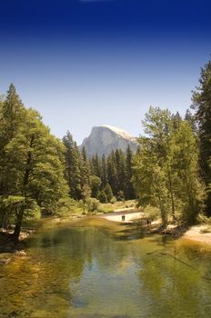 Half dome from Yosemite Valley with the merced river