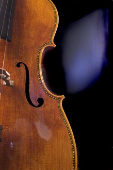closeup of the scroll work on a beautiful cello