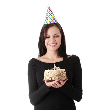 Beautiful young woman with birthday cake isolated on white background