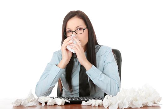 Young businesswoman in office with lot of tissues around - flue concept
