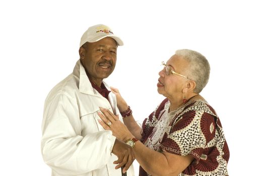 Attractive Elderly African American Woman talking to African American man isolated on white