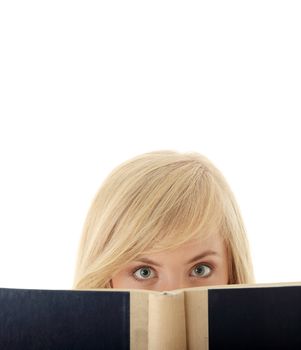 Girl reading a book, isolated on white background