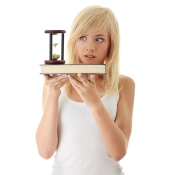 Don't have time to learn - teenager with book and hourglass