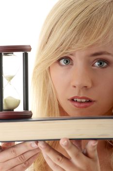 Don't have time to learn - teenager with book and hourglass