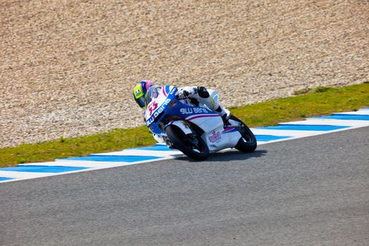 JEREZ DE LA FRONTERA, SPAIN - MAR 5:125cc pilot Sergio Gadea races on the official training of the world championship of MotoGP on Mar 5, 2011, in racetrack of velocity of Jerez de la Frontera, Spain