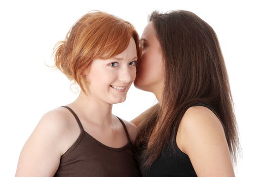 Two young womans talking gossip isolated on white background