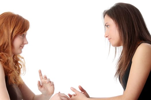 Two young womans talking isolated on white background