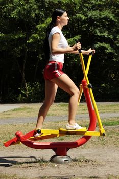 Young caucasian woman exercising outdoor
