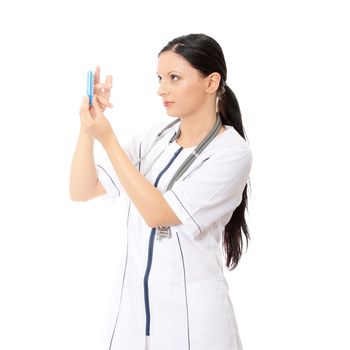Young female doctor or nurse holding syringe