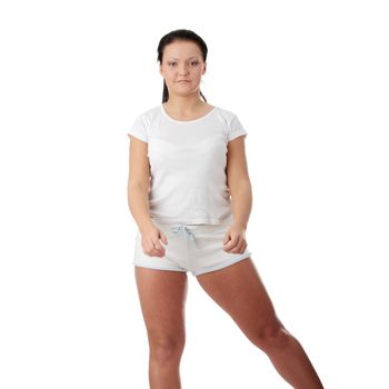 Young happy woman doing fitness exercises
