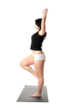 Corpulent woman training yoga, over white background