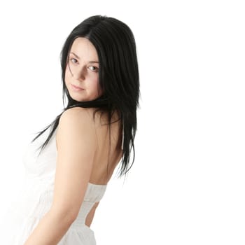 Corpulent caucasian female in elegant white dress, isolated on white background