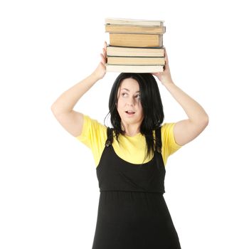Young corpulency student woman with lot of heavy books isolated on white background