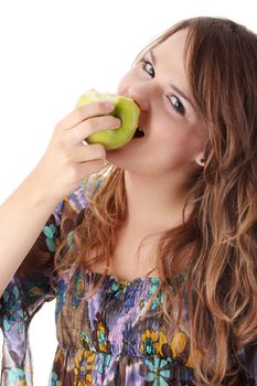 Teen girl eating grean apple isolated on white background