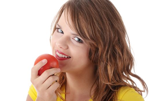 Young woman eating tomato isolated on white background