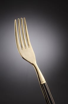 stockk image of the close up of the golden fork