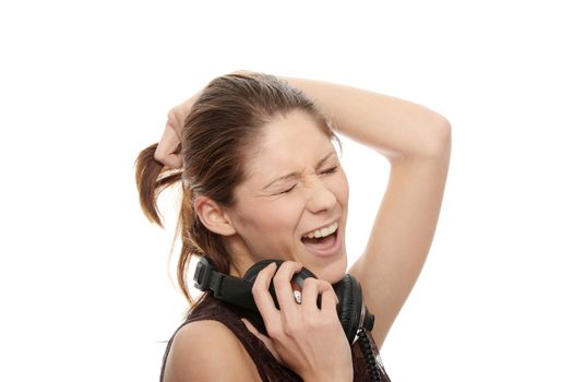 Young caucasian woman with headphones on her nack